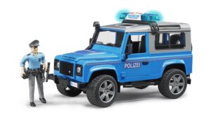 BRUDER policijos DŽIPAS LAND ROVER DEFENDER STATION WAGON policininko automobilis džipas su pareigūnu, 02597